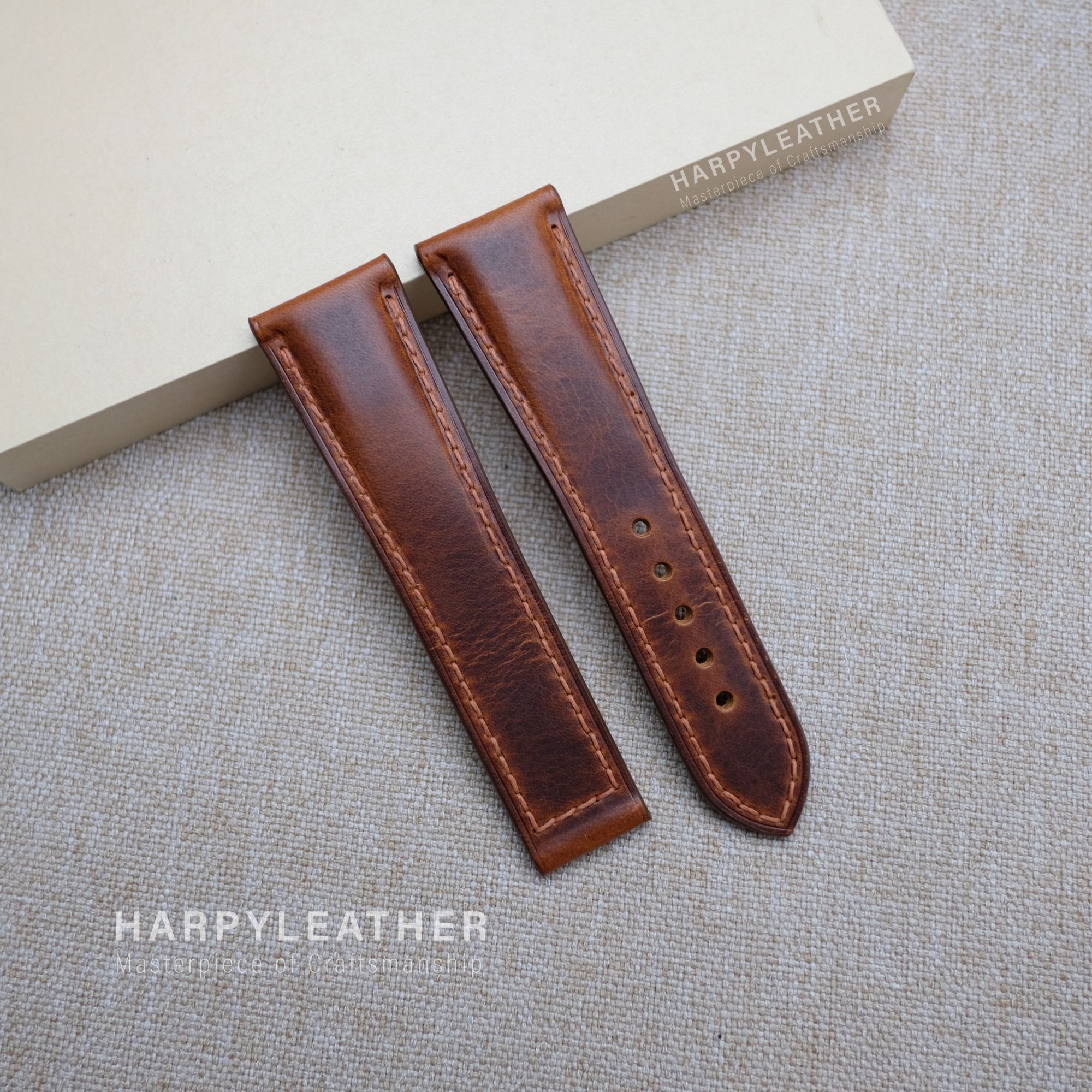 Brown waxy strap style clasp Brown waxy strap style clasp 1